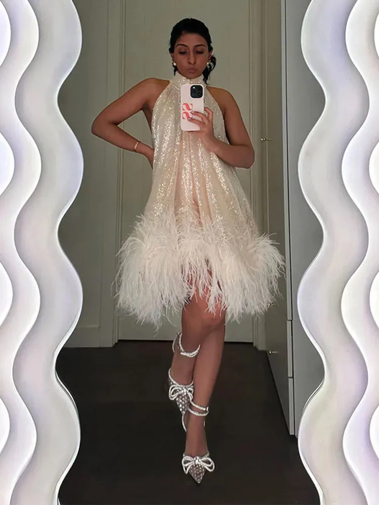 Christina - Sparkling halterneck dress with feathers